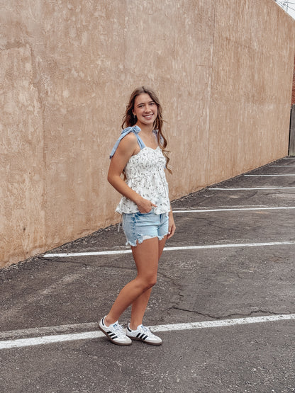 High Rise Distressed Washed Step Side Hem Shorts
