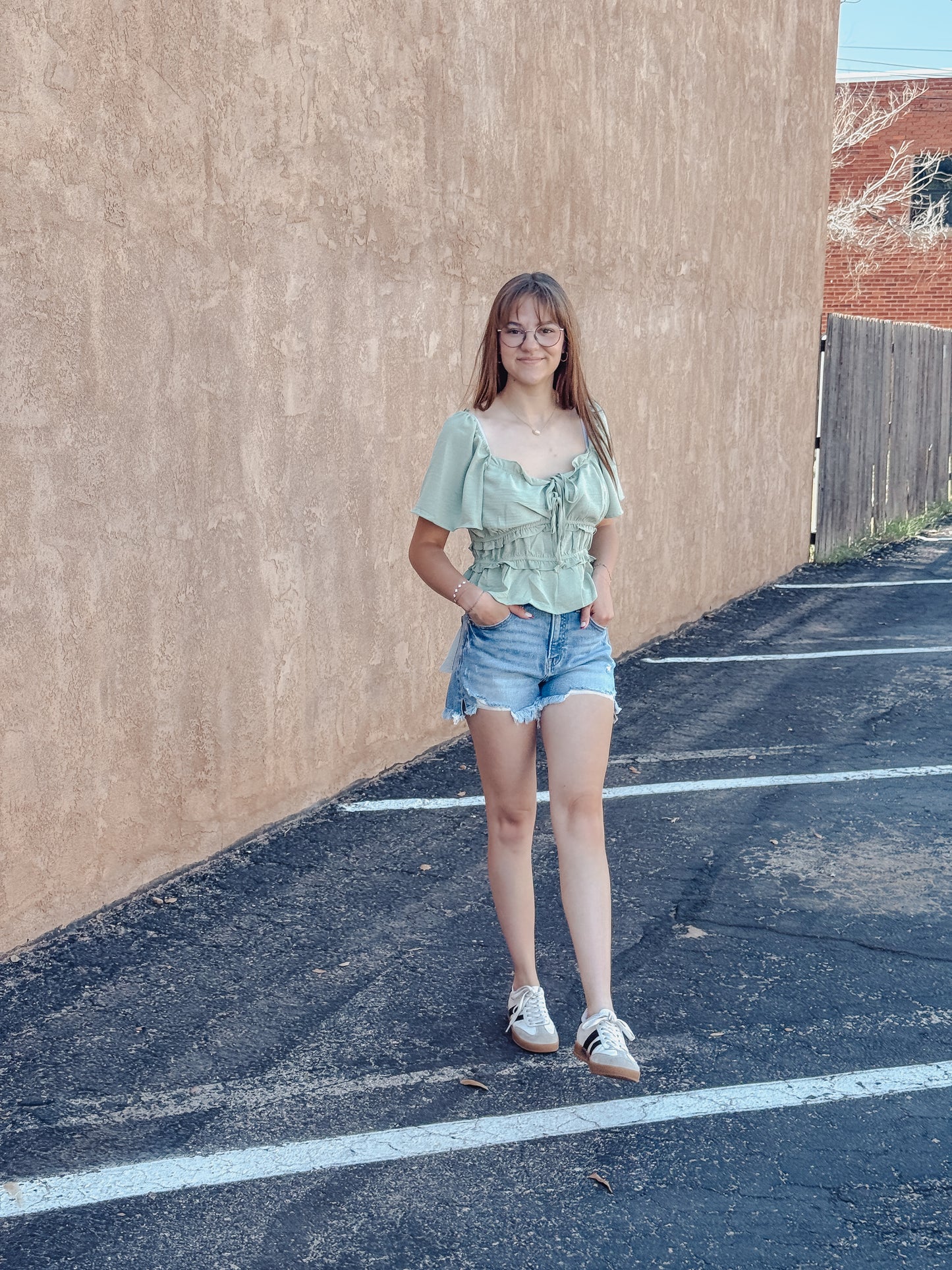 The Sage Blossom Peplum Tie Front Top